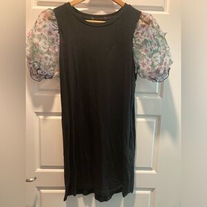black dress with transparent flower design puff sleeve.